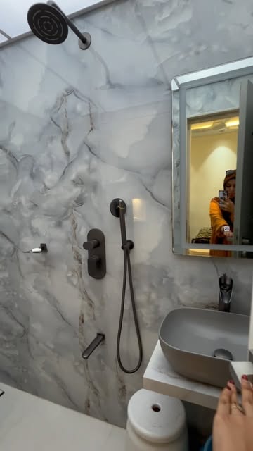 Bookmatched Marble Rain Shower Ensuite